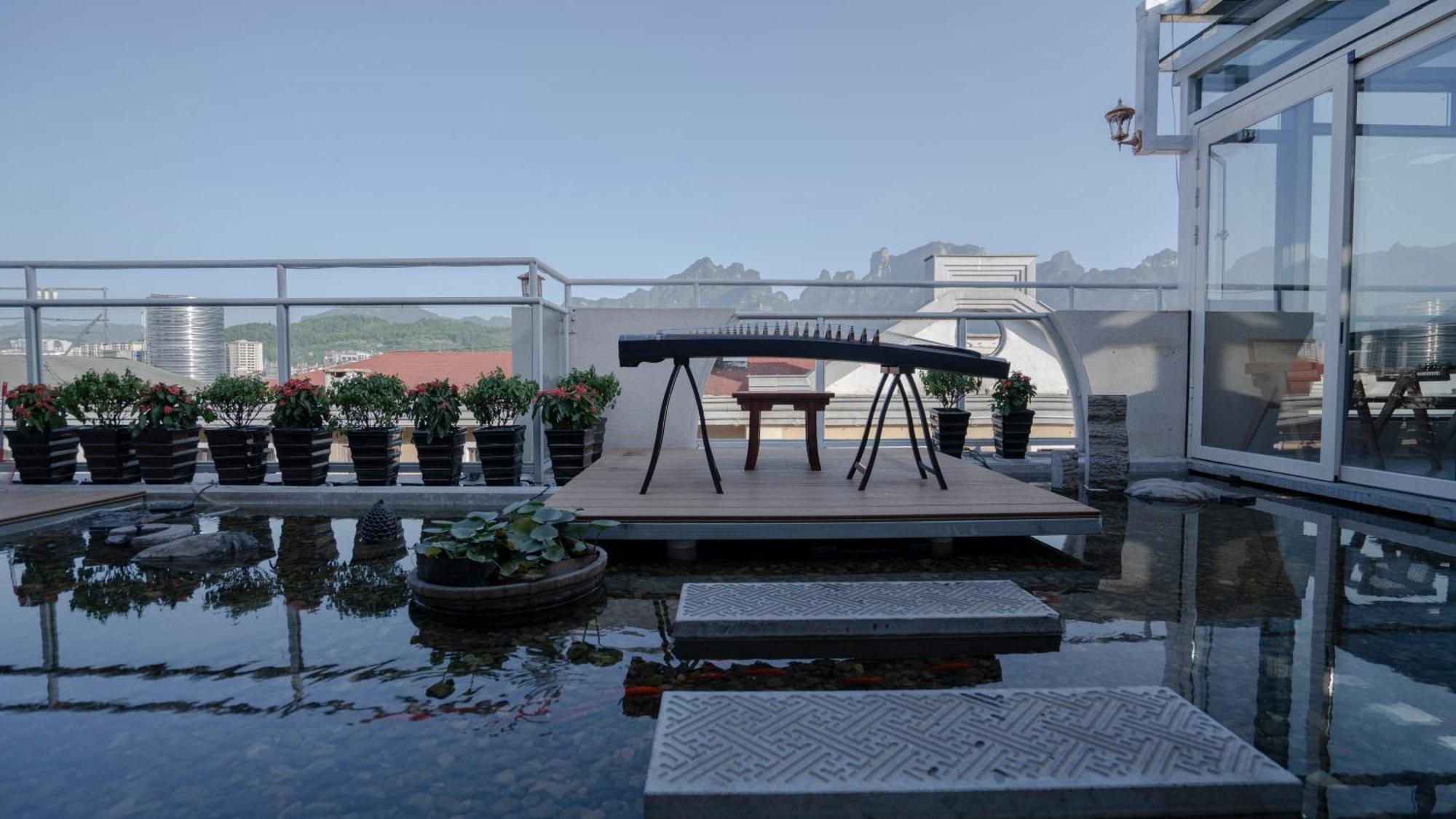 Patio Spring Holiday Inn -- Free Round Trip Pick-Up Service --Panoramic View Of Tianmen Mount Zhangjiajie Bagian luar foto