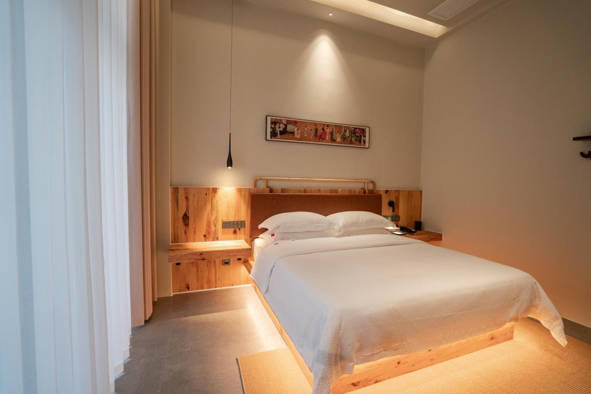 Patio Spring Holiday Inn -- Free Round Trip Pick-Up Service --Panoramic View Of Tianmen Mount Zhangjiajie Bagian luar foto