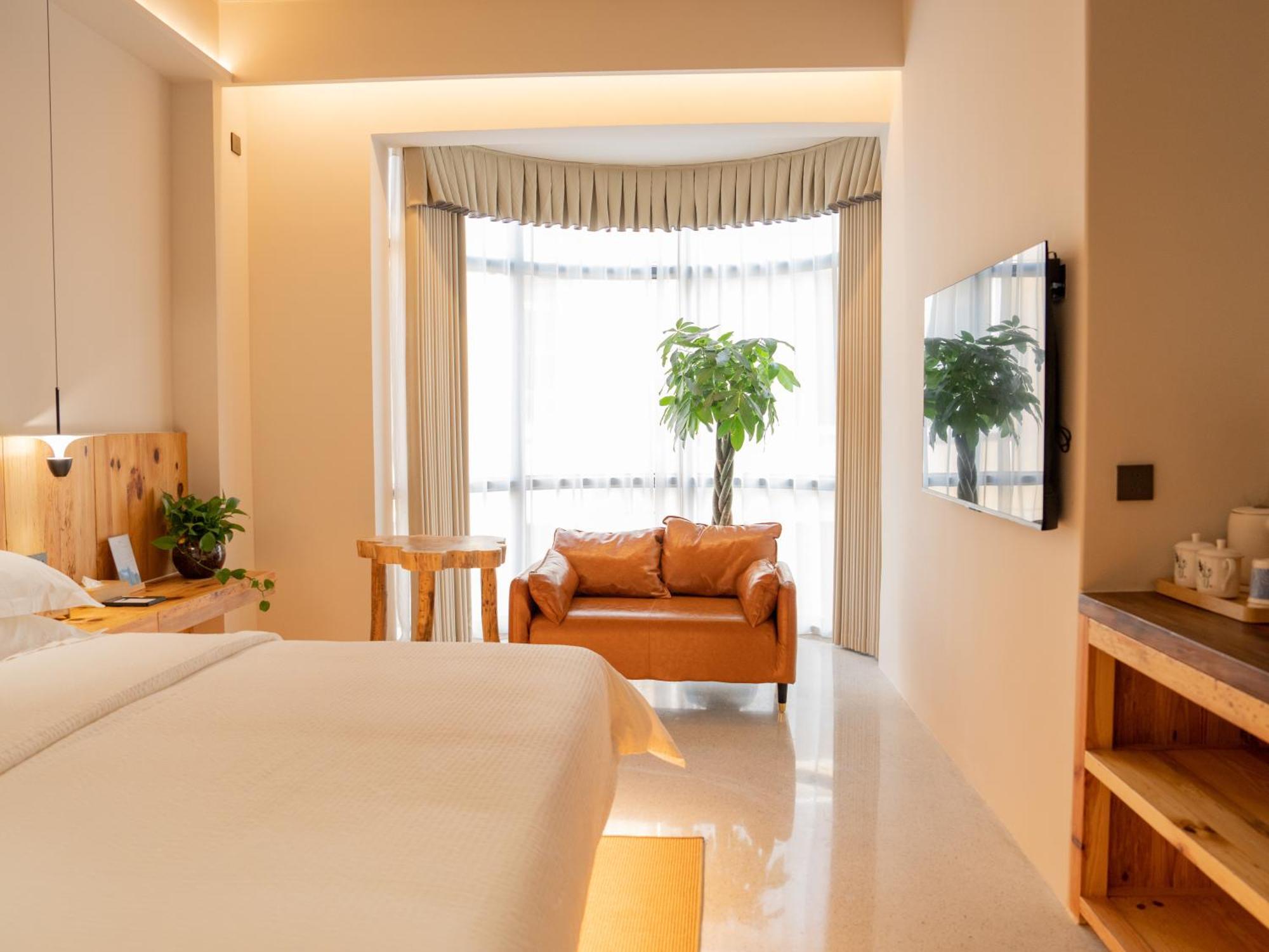 Patio Spring Holiday Inn -- Free Round Trip Pick-Up Service --Panoramic View Of Tianmen Mount Zhangjiajie Bagian luar foto
